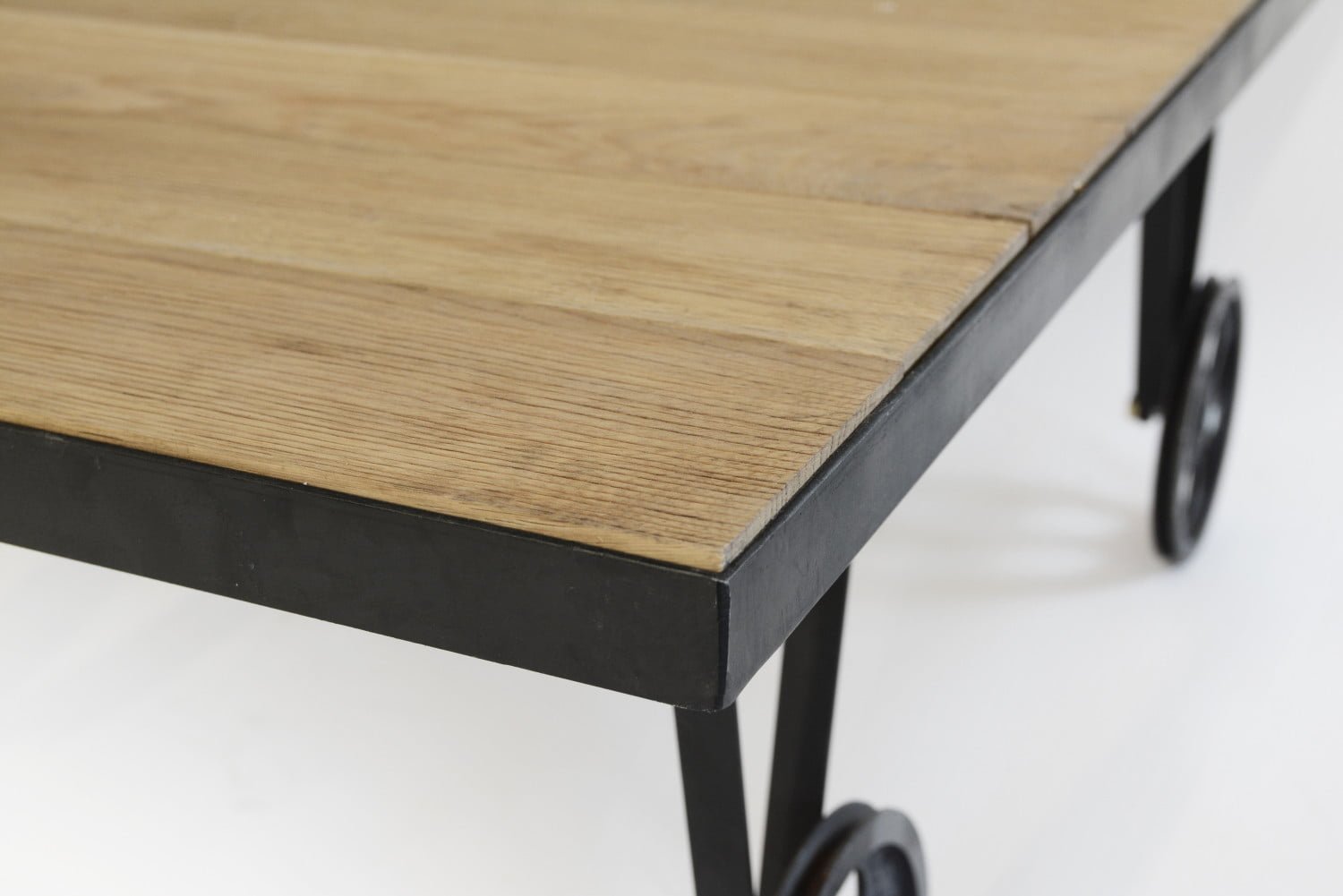 Oak coffee table on wheels with a brushed wooden top 